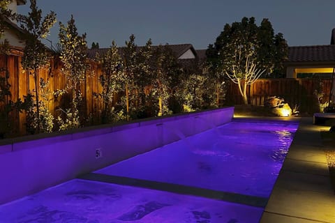 Pool and Hot Tub at Night