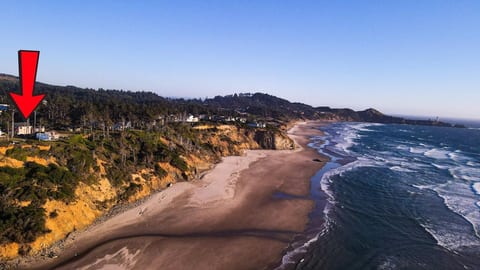 view of beach below house