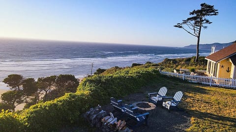 Watch and listen to the ocean while sitting around the firepit.