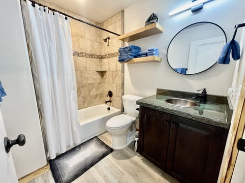 Full size tub with shower