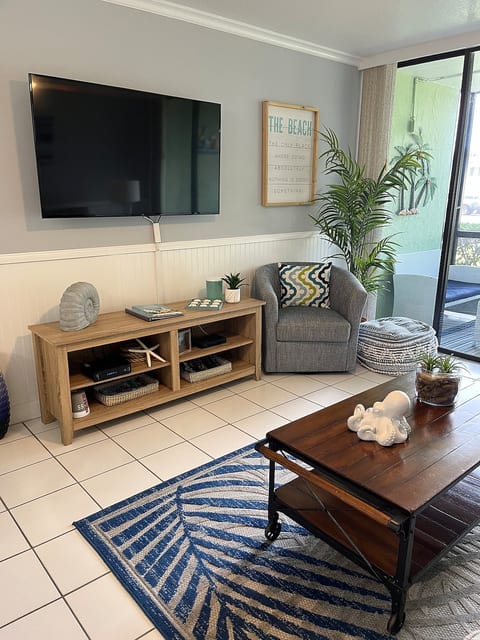 Main living area has a Smart TV and seating for 4