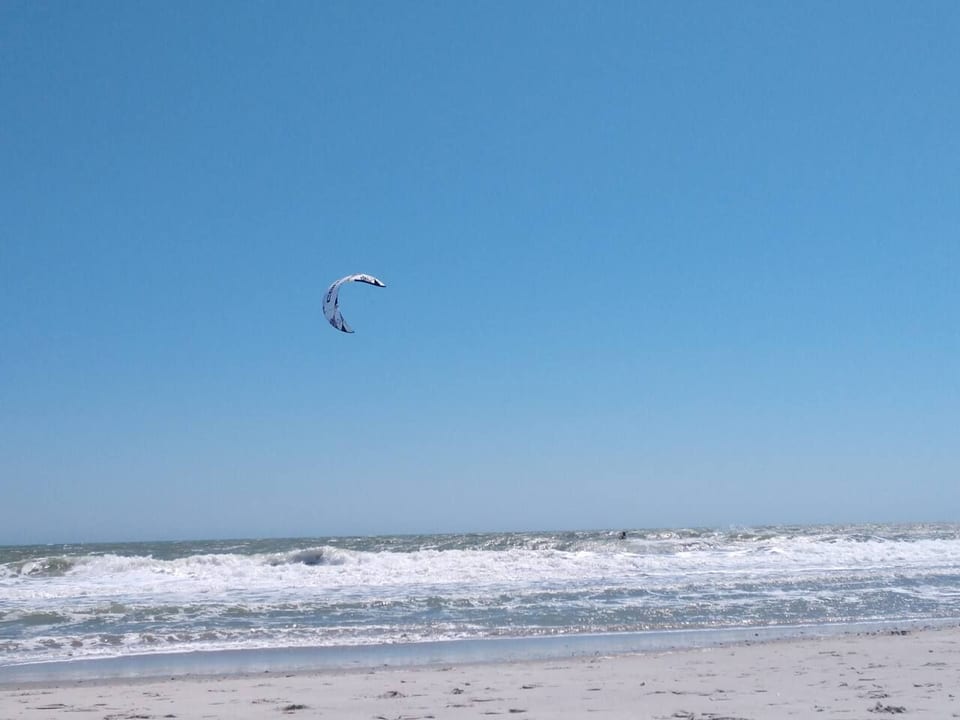 While it's pretty calm most of the time, when storms come in, the kite boarders and surfers enjoy the winds and waves.
