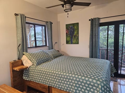 Beautiful, hand-crafted, queen-size bed with built in nightstand on each side and drawers underneath.