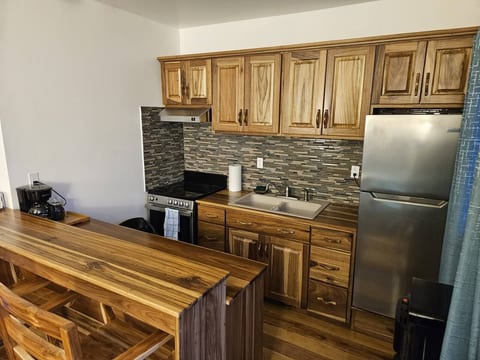 Full kitchen, nicely equipped for cooking meals when you want to eat in.