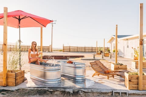 Soak beneath sunny desert skies by day and the Milky Way by night.