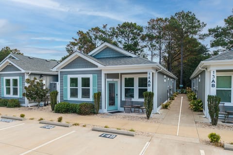Charming cottage-style retreat with private entry and front parking