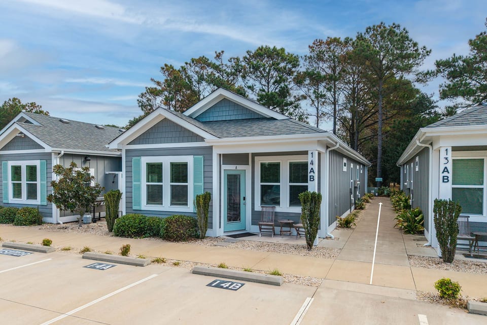 Charming cottage-style retreat with private entry and front parking