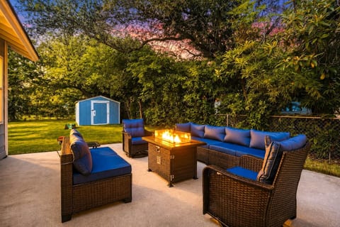 Fenced backyard with propane fire pit