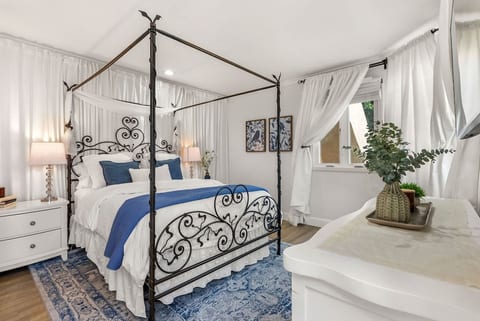 Wrought iron canopy in master bedroom