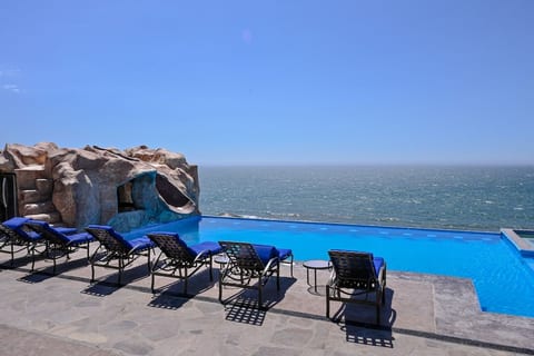 Triton's Place | Infinity Pool-Spa | Firepit image 2