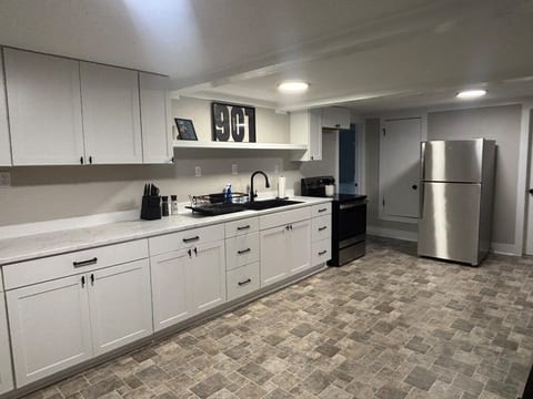 Open, fully-equipped kitchen.