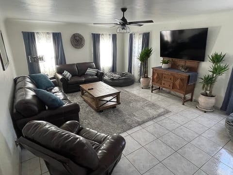 Enjoy some tv on our 75” flat screen smart TV