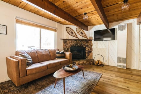 Enjoy the cabin’s fireplace and fully stocked firewood.
