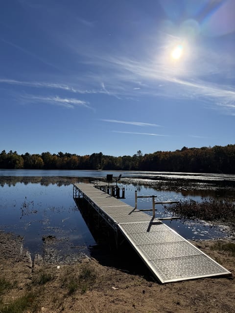 Private lakefront dock with serene water views and direct outdoor access