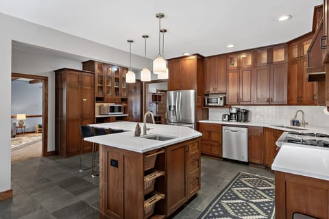 Huge kitchen with 2 sinks and plenty of counter space for cooking/serving for large groups!
