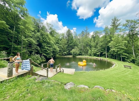 Your own private swimming pond right in the back yard! We provide beach and water toys. 