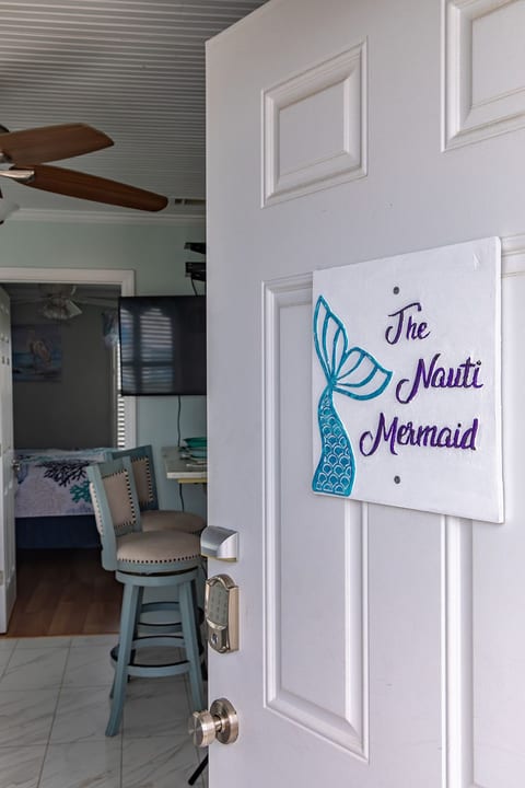 Step inside The Nauti Mermaid and get your first glimpse of the space. The entry opens directly into the condo, setting the tone for a clean, well-cared-for retreat just moments from the beach.