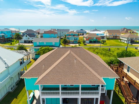 Being only steps from the beach, you can enjoy the coastal sounds and view from the upper deck!