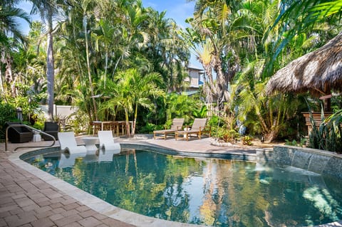 Blue-water bliss with swaying palms above