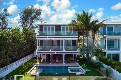 Elevated beachfront home with pool