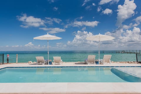Your waterfront pool retreat awaits