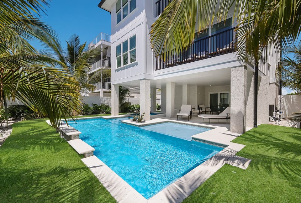 Pool retreat steps from the beach