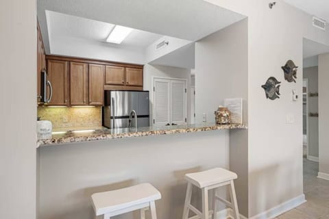 Resort pool | Updated kitchen | Walk to the beach