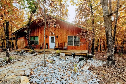 Front of Hideaway Cabin, secluded rustic cedar cabin nestled in Ozark woods.