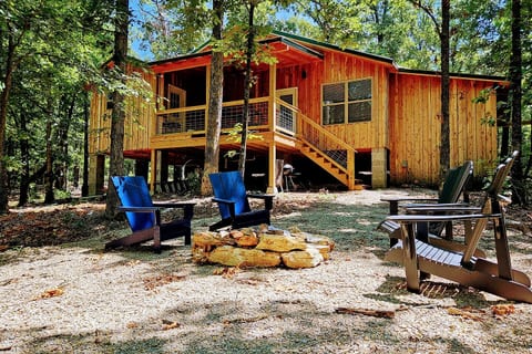 Rear of Cabin, secluded rustic cedar cabin nestled in Ozark woods.