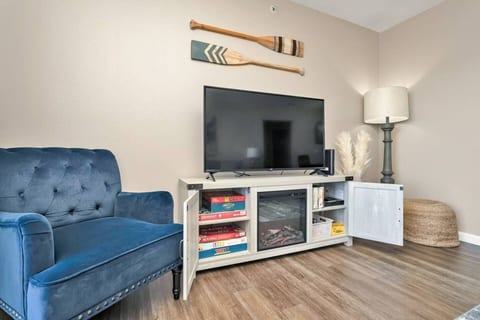 Plenty of couch room for family movie night, with a Roku TV and an electric fireplace for cool evenings.