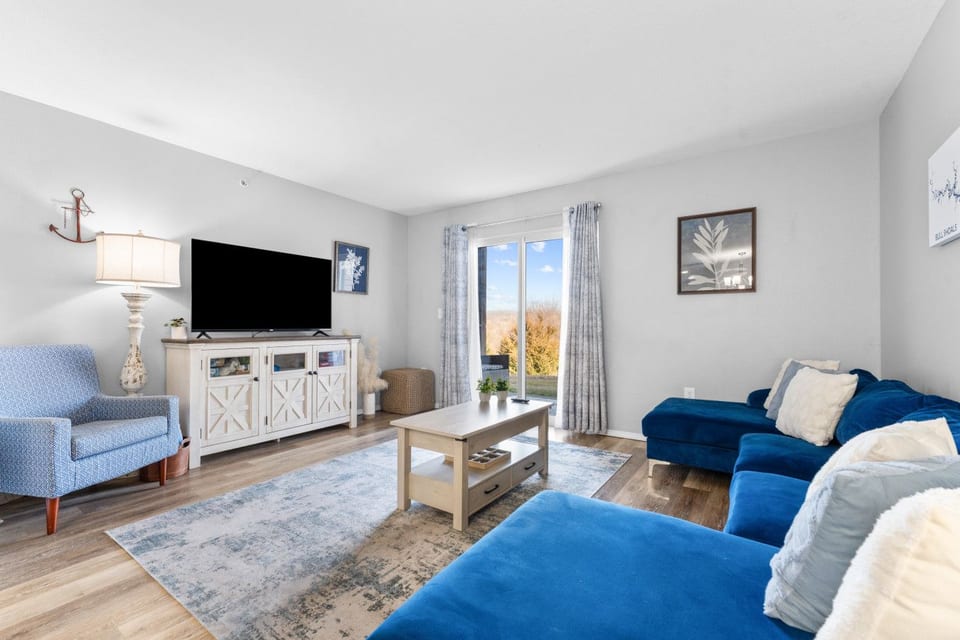 Room on the couches for both families after a day at the park, with a Roku TV for movie night.