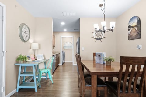 Two dining tables. Eat together in one condo, or split up across the hall.