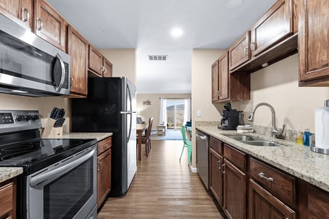 Two full kitchens, each with a dishwasher and a Keurig, so breakfast for 16 isn’t a relay.