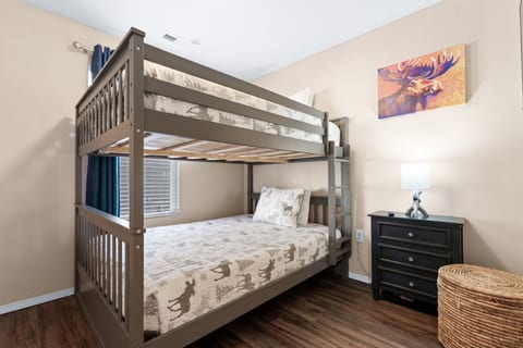Two bunk rooms with full-over-full bunks for kids 14 and under. Top bunks have a 150 lb limit.