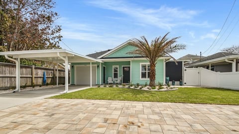 Welcome to your bright and beachy home away from home! This charming coastal cottage features tropical landscaping, private parking with covered carport, and a spacious front patio—all just minutes from the beach, dining, and local attractions.