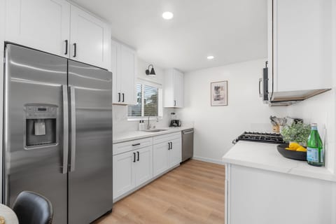 Fully stocked kitchen for home made cooking.
