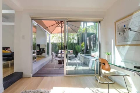 Bedroom with view of the private patio