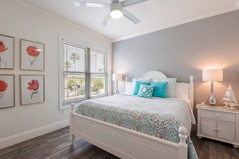 Private KING bedroom with TV, ceiling fan, charging stations and plenty of storage.