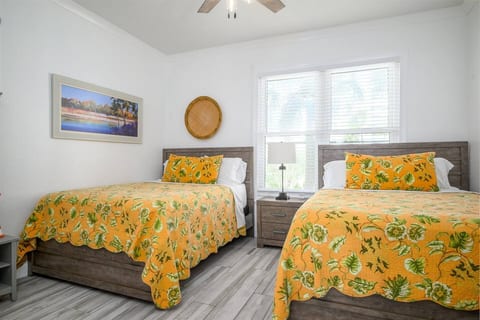 Two QUEEN beds make this spacious second suite ideal for families, friends, or groups who want comfortable sleeping arrangements and plenty of room.