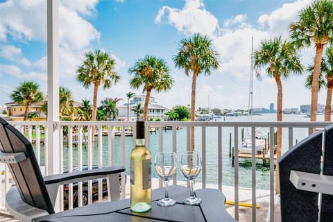 Relax on your private balcony overlooking the harbor—perfect for morning coffee or an evening glass of wine.