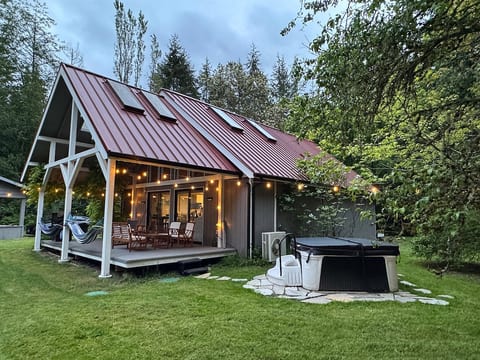 Serendipity in the Pacific North West. The main house from the yard over the outdoor hot tub.
