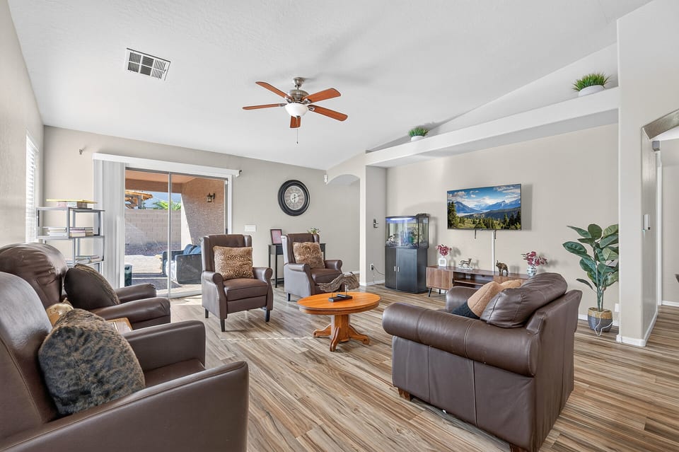 Bright, spacious living room with patio access and comfortable seating