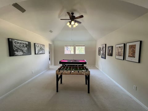 Game loft, pool table, foosball table.