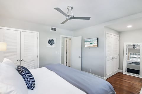 Retreat to your king size bed with 100% cotton linens, smart tv and clothing storage