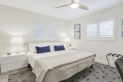 King size bed, quality cotton linens, bedside lamps, ceiling fan, luggage rack