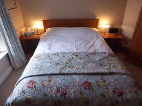Comfy double bed in the main bedroom
