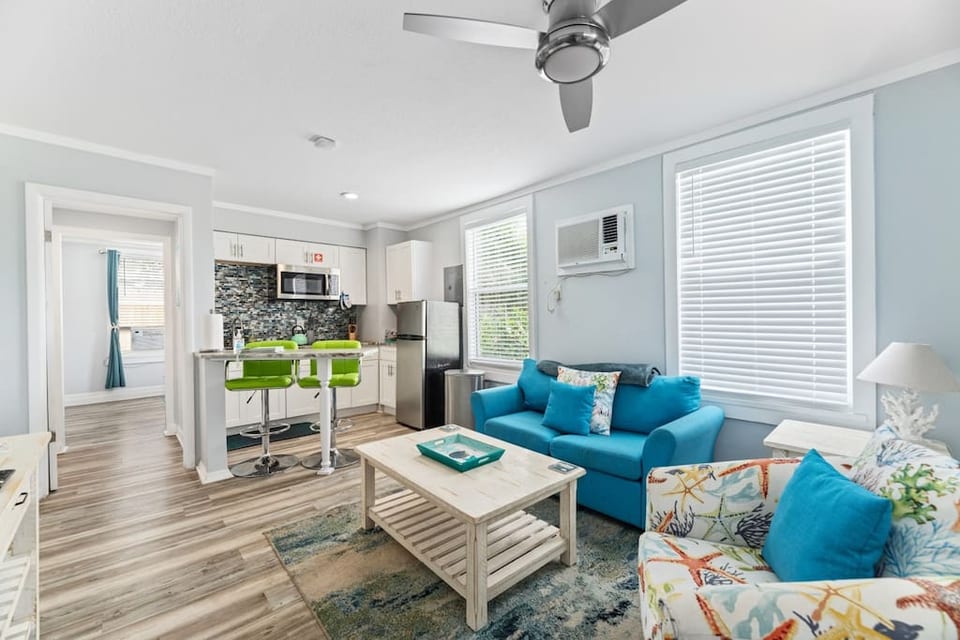 This is the living room, as seen from the entry door. This photo was taken with a wide-angle lens to show the entire room.