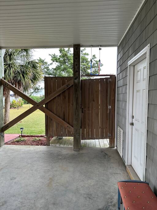 Outdoor shower to wash off those sandy feet. - Relaxation awaits at Crabby Chuck’s beach house! - Surf City