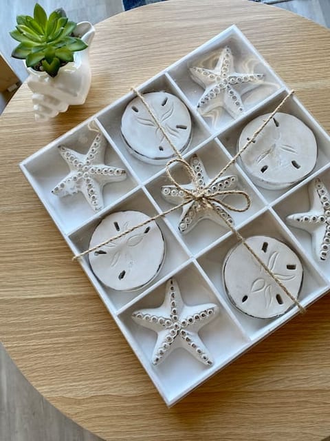 Everyone loves tic, tac, toe. This one fits right in with the beach theme of the house.