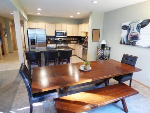 The dining room table extends to accommodate eight guests easily.
